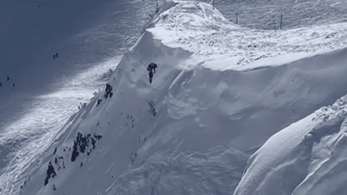 pro skier cliff jump, extreme skiing, winter mountain panorama