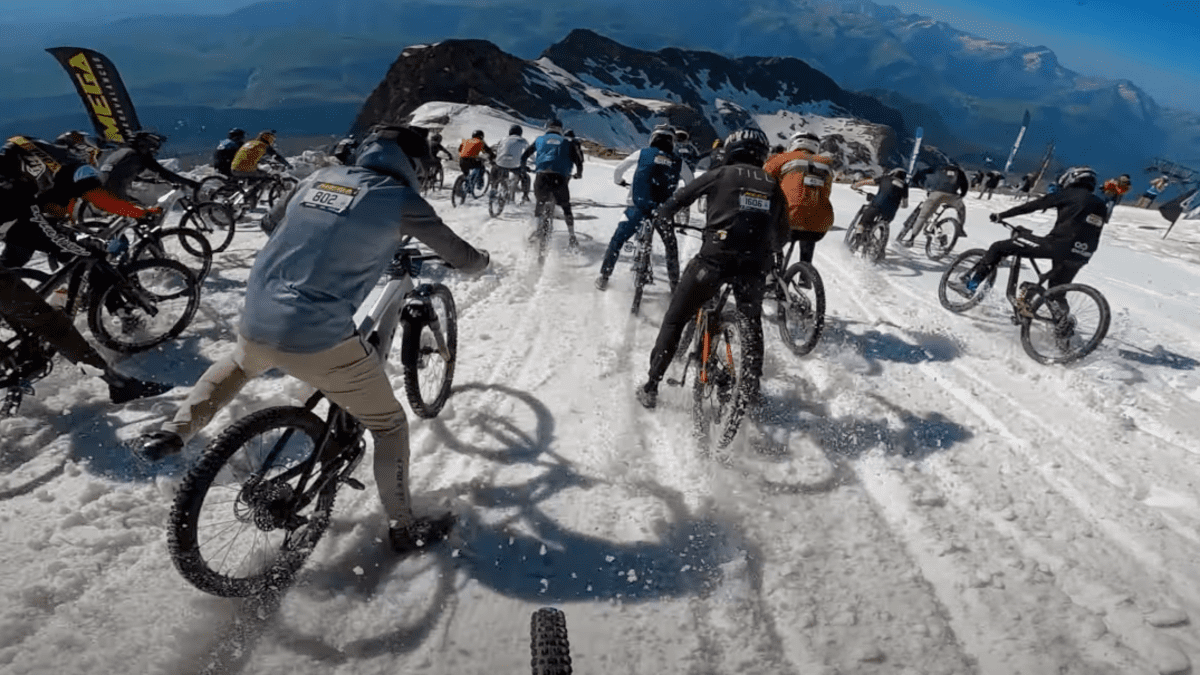 Look Hundreds Of Mountain Bikers Simultaneously Descend Snow