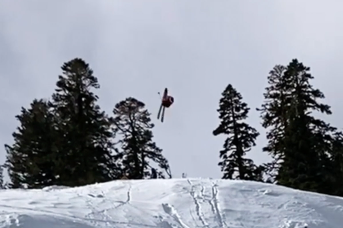 Young Professional Skier Tests Triple Backflips - Powder